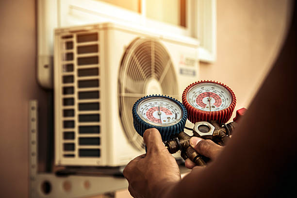 Professional Heat Pump Repair technician working in Esopus, NY